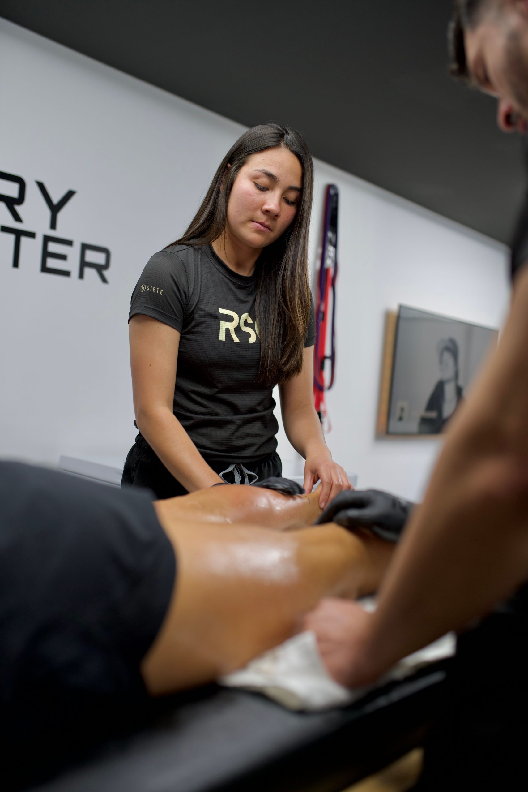 Sports therapist providing a recovery massage